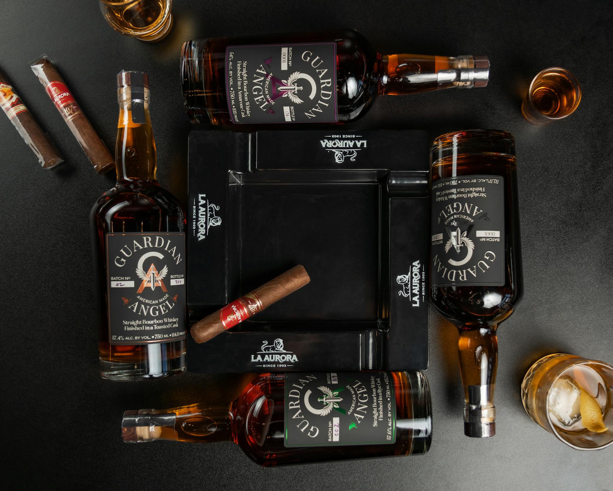 A captivating flat lay of Guardian Angel bourbon bottles and cigars in New Orleans bar ambiance.