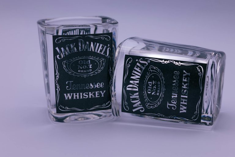 Close-up of Jack Daniel's themed whiskey glasses in a studio setting.