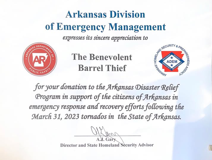 A certificate from the Arkansas Division of Emergency Management expressing appreciation to The Benevolent Barrel Thief for their contribution to the Arkansas Disaster Relief Program following the tornadoes on March 31, 2023.