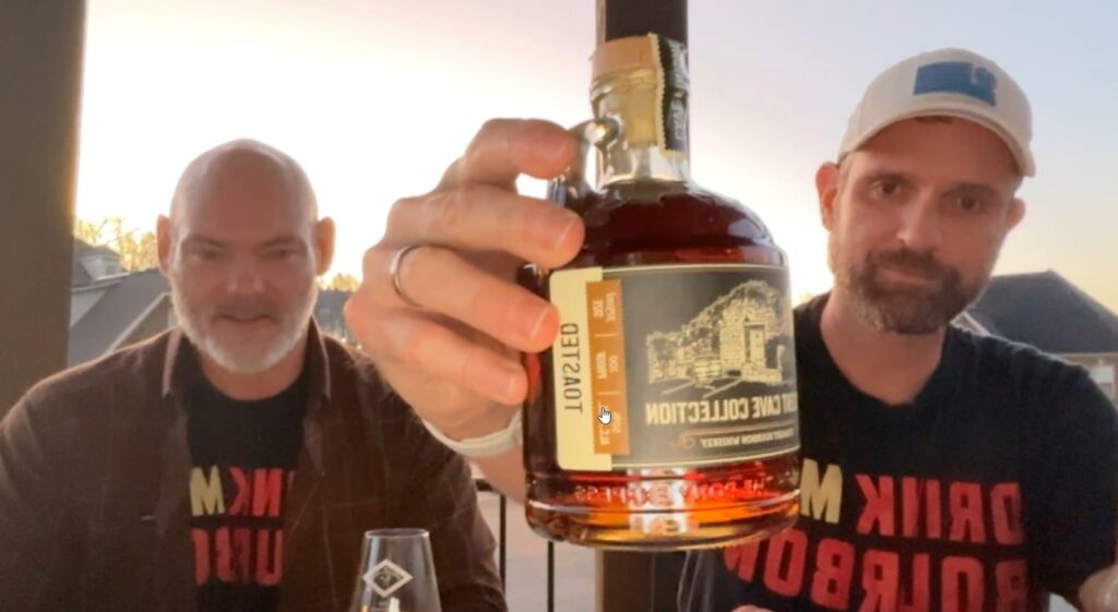 David Chaloupka and Jeff Franzetti of the Bourbon Club of Arkansas announce a Holladay Distillery single barrel pick, standing together indoors during the January 6, 2026 announcement.